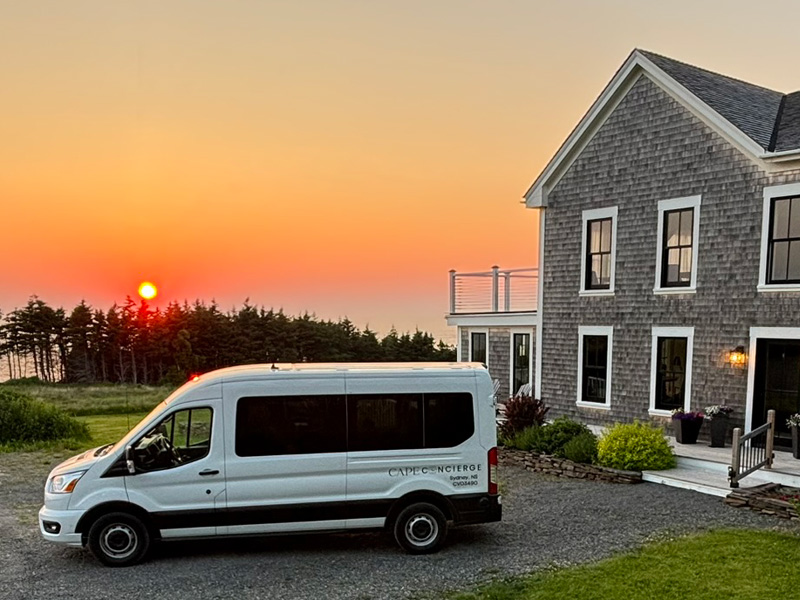 Private transportation van at sunset in Cape Breton Nova Scotia near Woodroad